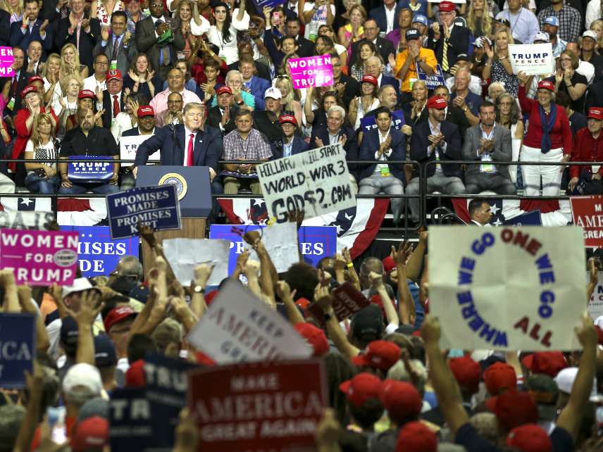 At Trump Tampa Rally, QAnon Conspiracists Abound as President Claims ...