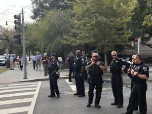 Police stand at one of many D.C. intersections to prevent cars from passing through. | Noah Shepardson