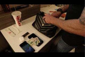 FBI agent rifling through a woman's purse | FBI