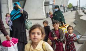 Afghan evacuees arrive at Dulles International Airport in Virginia