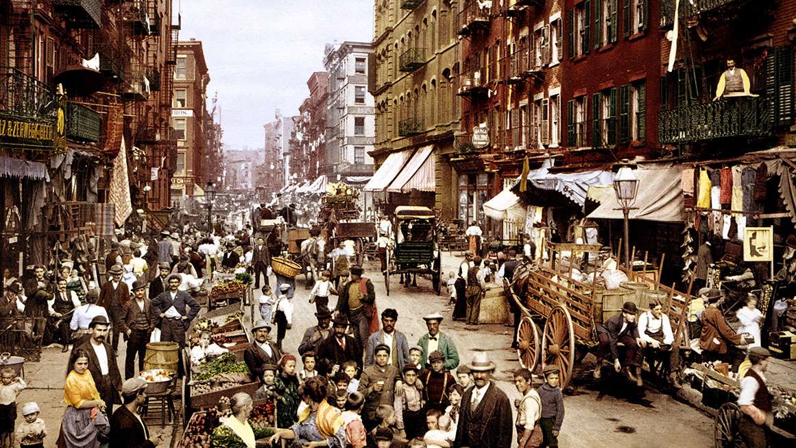 [Here's the photo of a crowded urban streetscape in 1900.]