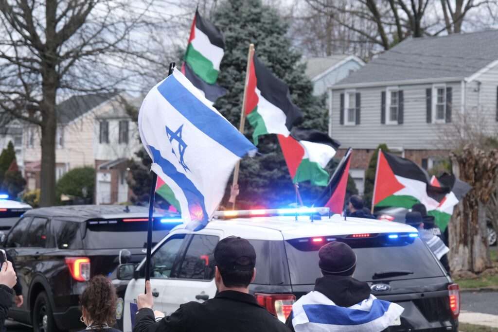 Pro-Israel counter-demonstrators confront a pro-Palestinian demonstration on March 10, 2024, in Teaneck, New Jersey.