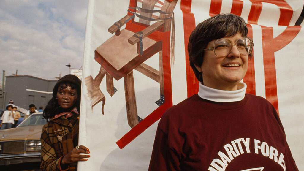 Photo: Prejean outside the Louisiana State Penitentiary, 1990; Sophie ELBAZ/Sygma via Getty Images