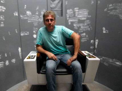 Writer-Producer Alec Peters sits in a captain's chair on the unfinished set of his Star Trek fan film Axanar.