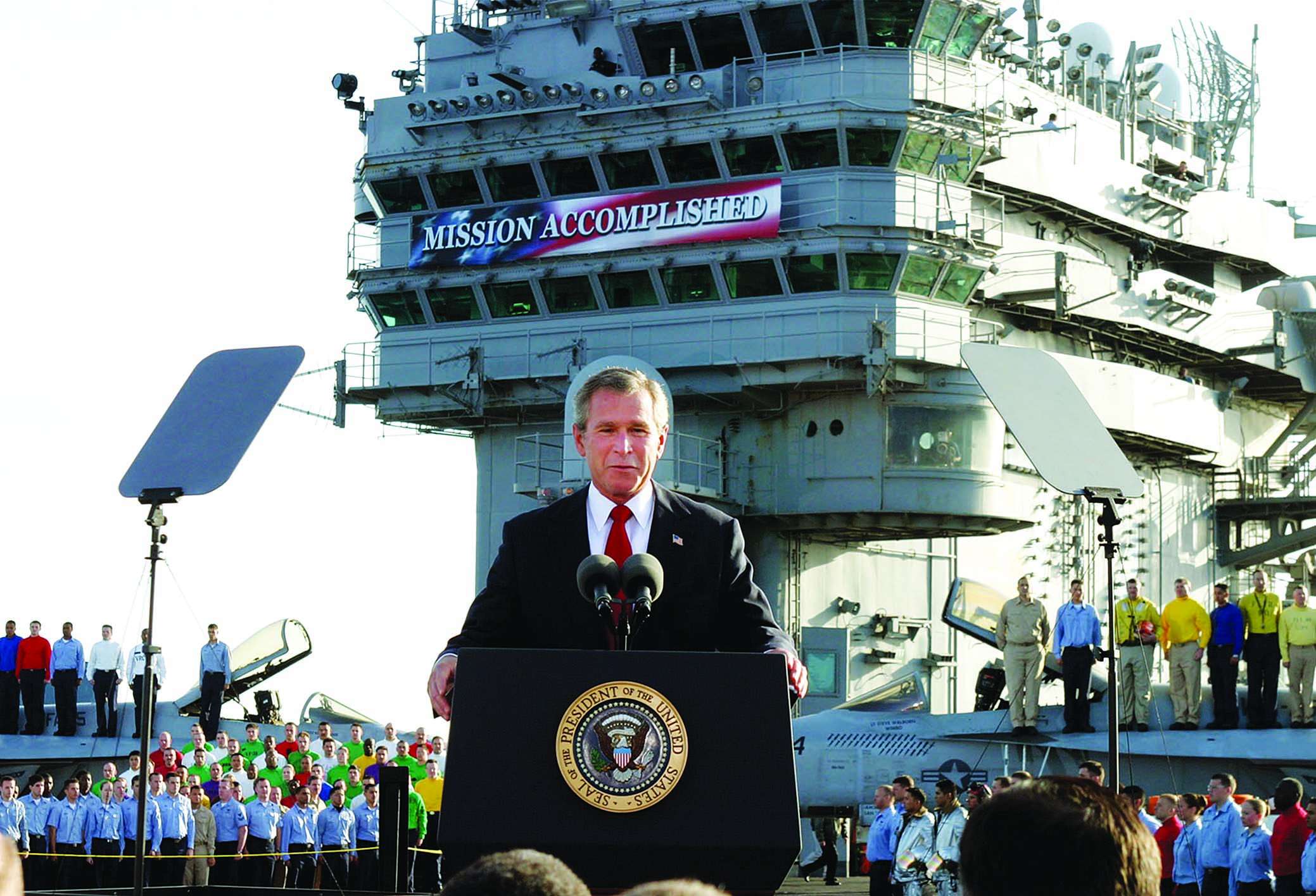 George W. Bush declares the mission accomplished in Iraq.