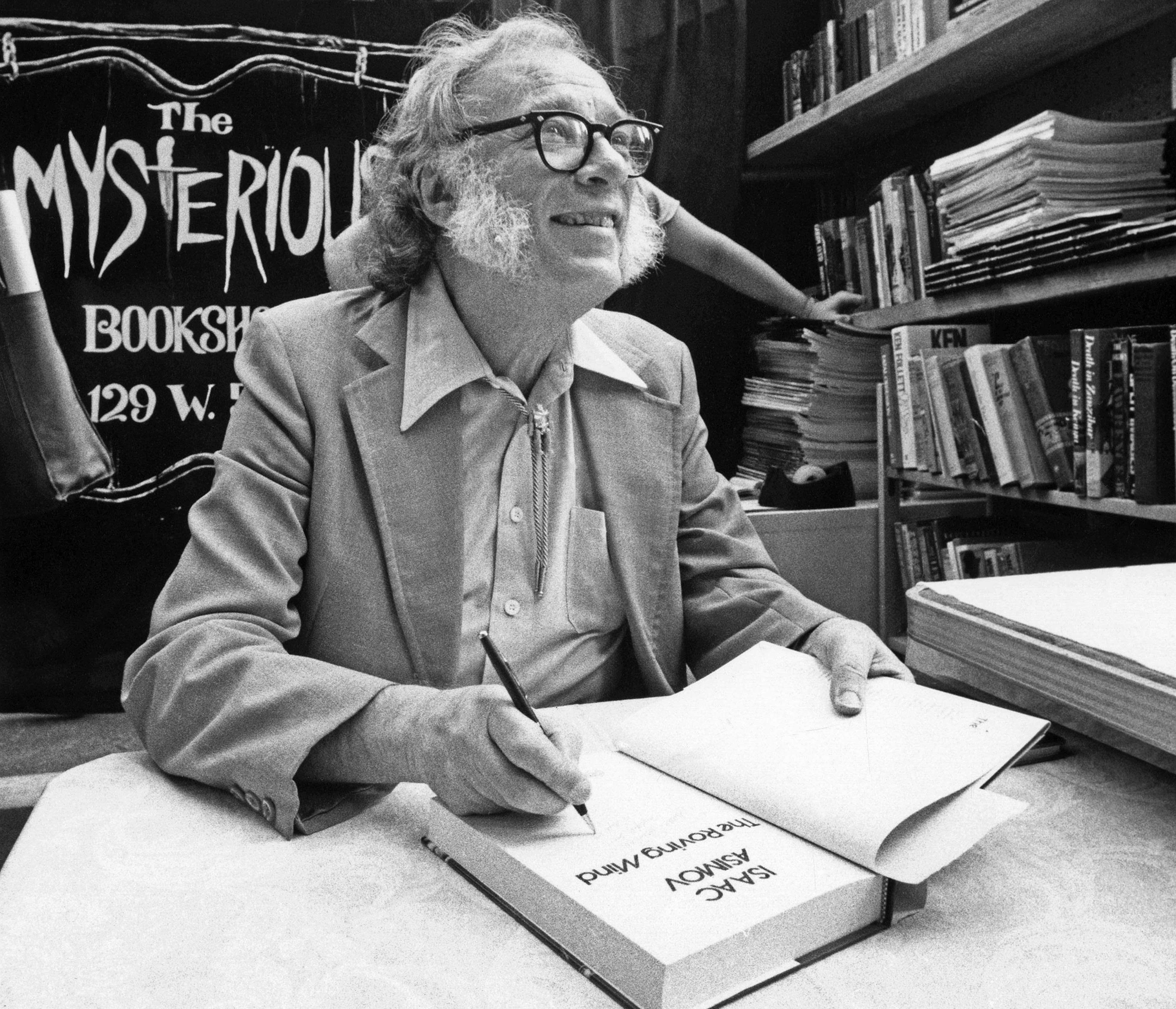 Isaac Asimov signing books.