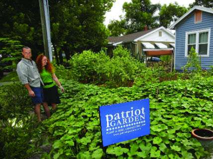 Jason and Jennifer Helvenston in their front yard garden