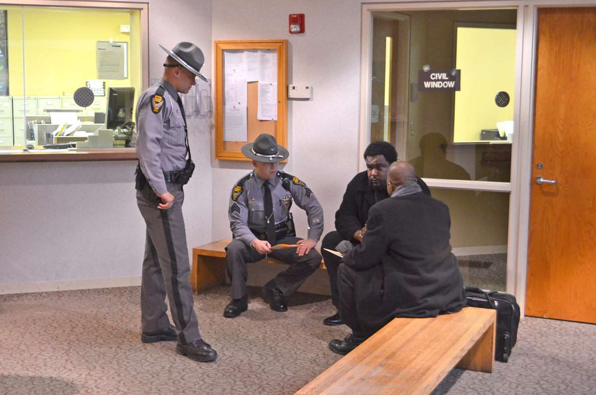 Norman Gurley meets with his attorney and Ohio state troopers