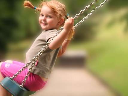 Girl on swing