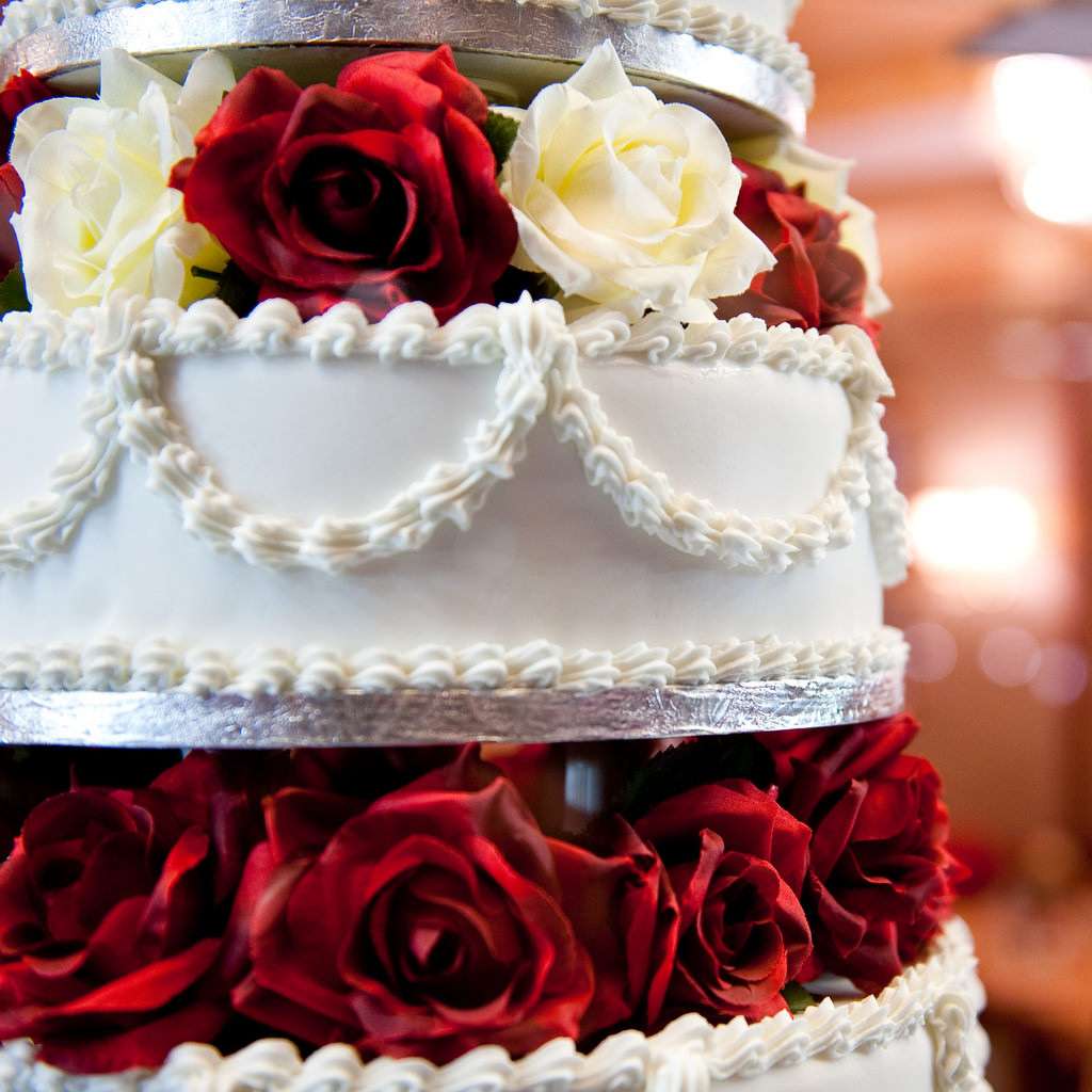 Wedding cake with red roses