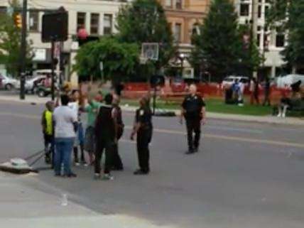 Warren, Ohio, police officers shoot hoops with local teens