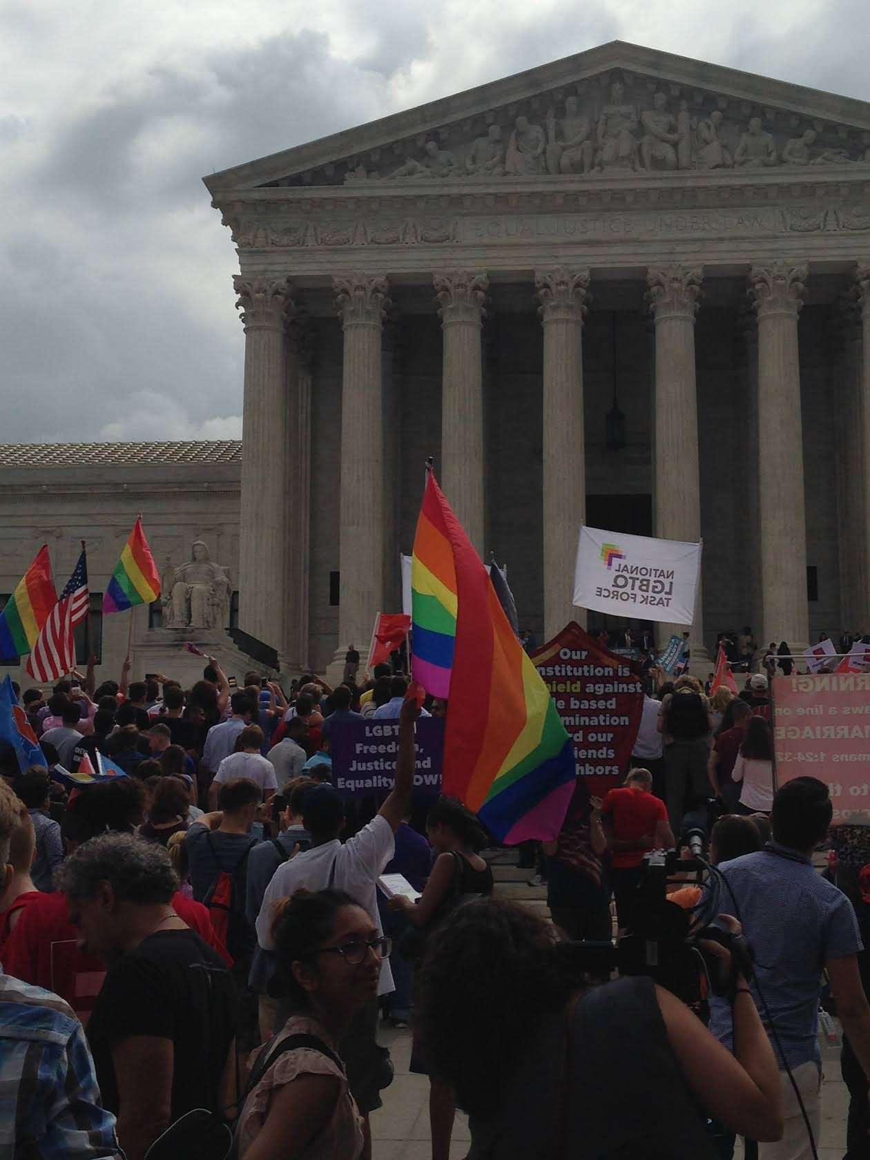 People rally outside the Supreme Court after SCOTUS handed down its gay marriage decision