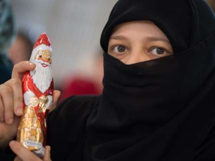 Syrian refugee with Christmas Chocolate