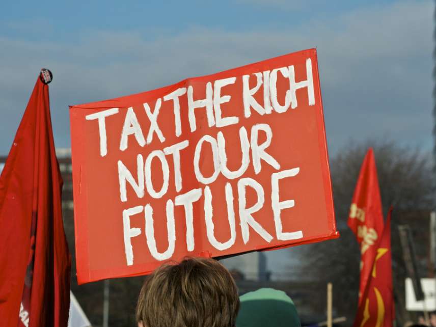 Tax the rich, not our future placard