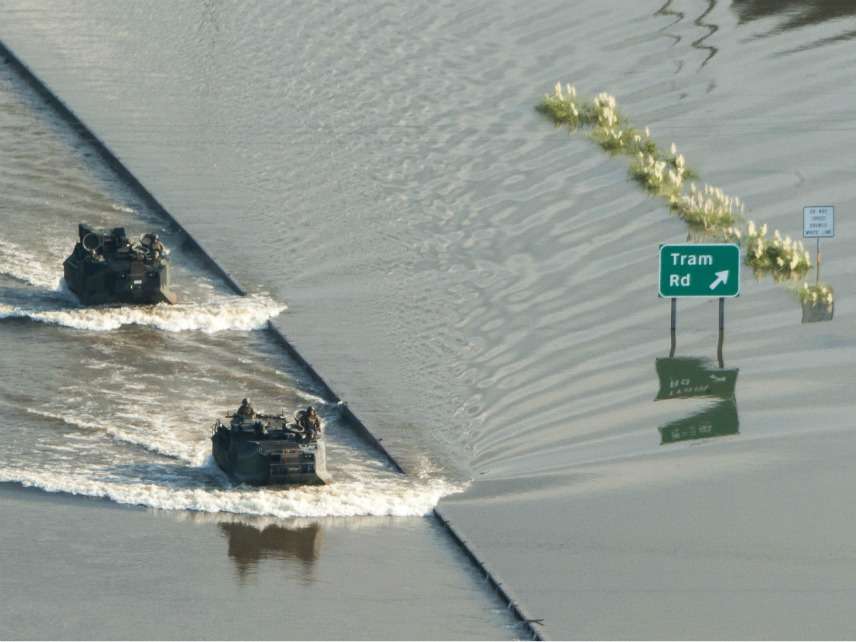 U.S. Marine Corps Assualt Amphibian Vehicles move through Hurricane Harvey flooded areas to north of Beaumont, Texas