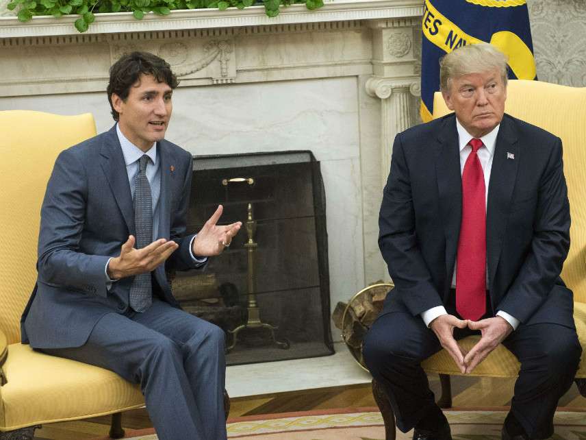 peaks alongside United States President Donald Trump during a meeting in the Oval Office