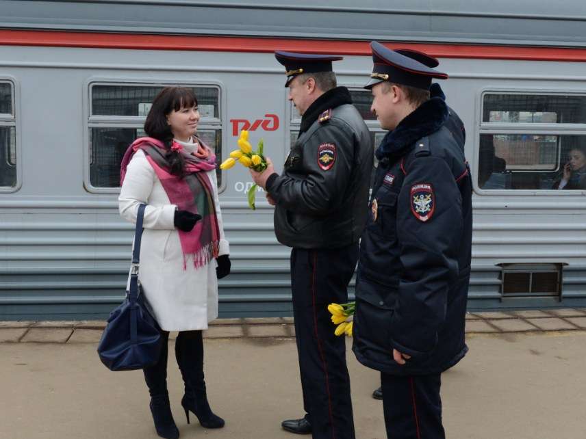 Police officer with flowers