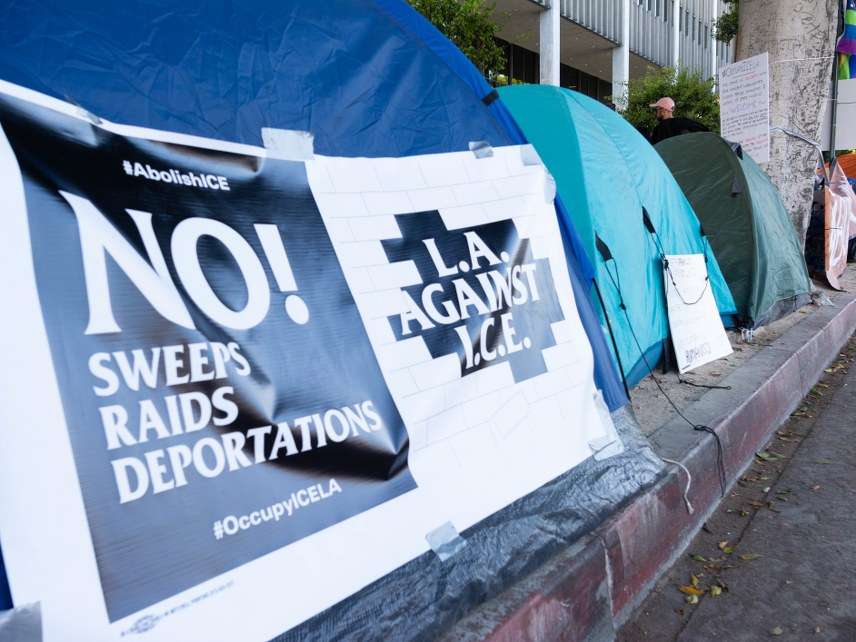 ICE raid protest signs