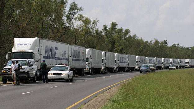 Wal-Mart convoy lined up to deliver supplies to New Orleans post-Katrina. Yeah, really. Wal-Mart relief convoy