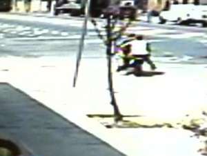 Surveillance image of a deadly police chase in the Bronx (credit: CBS 2)