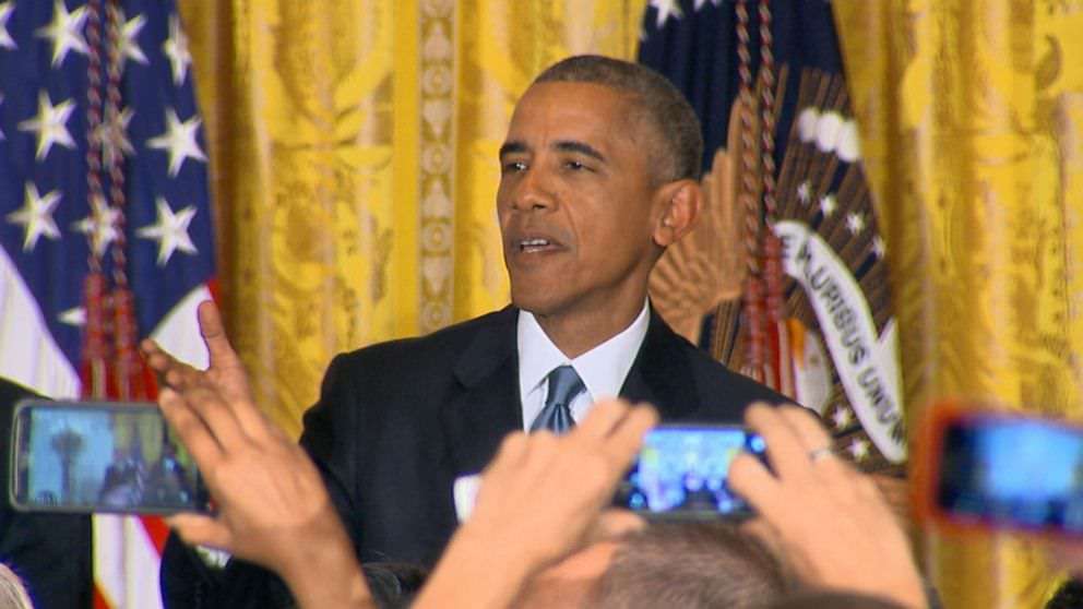 She also very rudely interrupted people in the crowd taking selfies with Obama in the background.