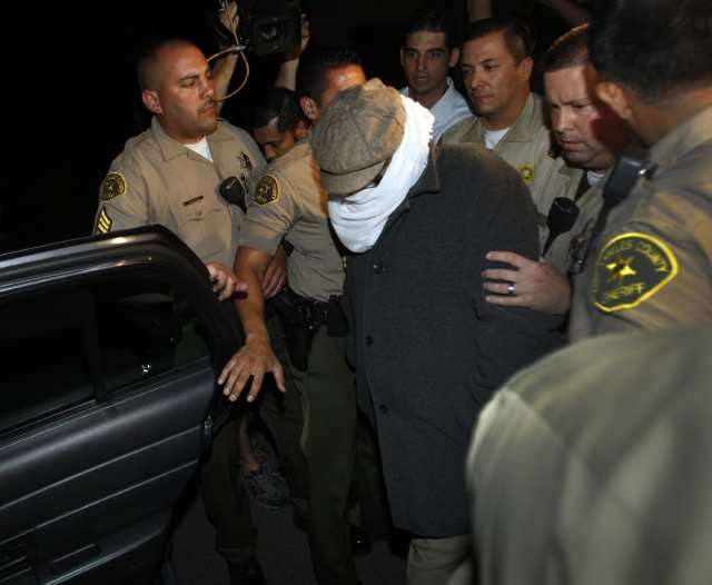 Helluva perp walk for a probation violation. ||| Allen J. Schaben / Los Angeles Times