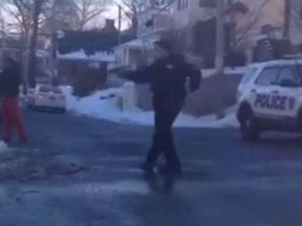 Cop brings a gun to a snowball fight.