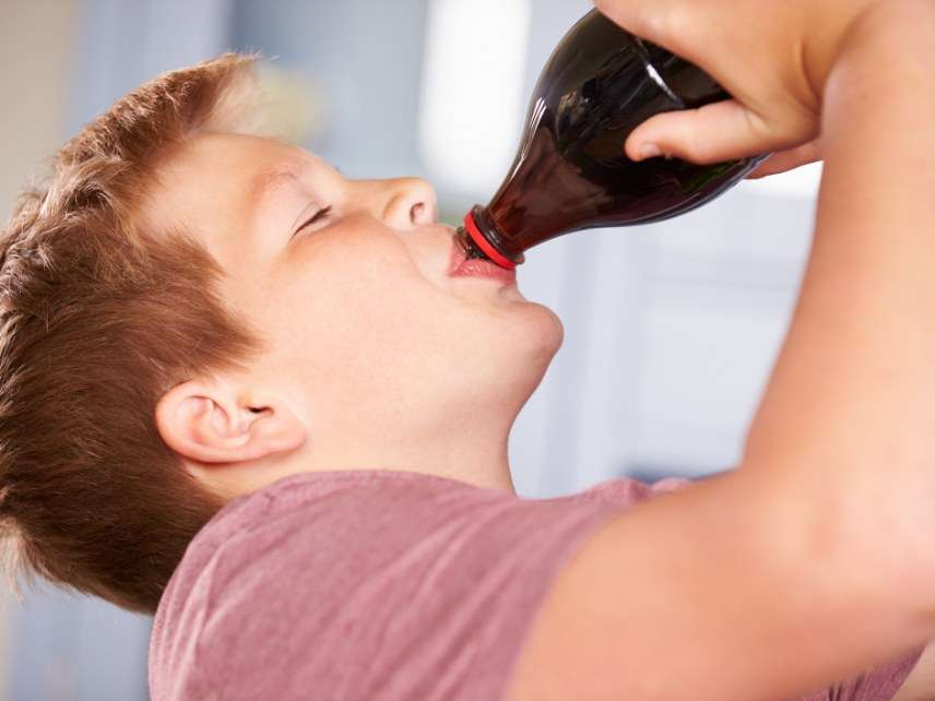 Kid drinking soda