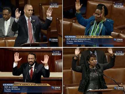 Four members of Congress with hands up