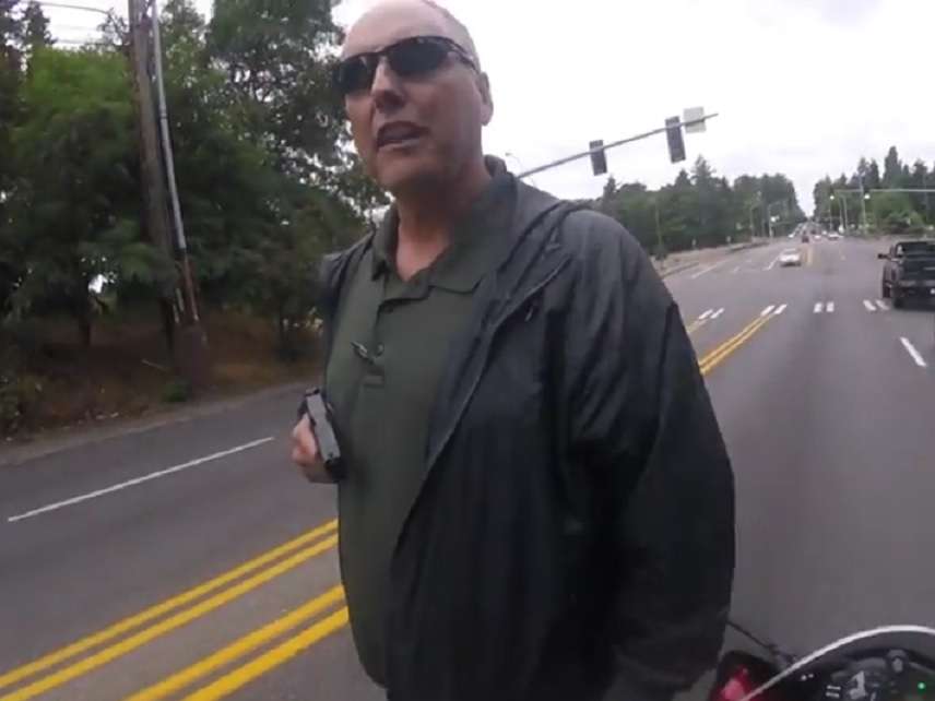 Plainclothes Cop Caught On Video Pointing Gun Threatening Motorcyclist