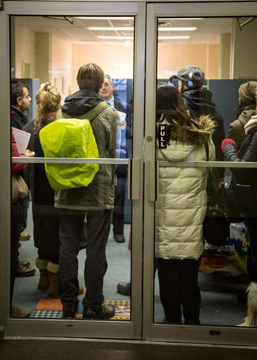 The group is greeted by Brad Usher, Sen. Krueger's chief of staff ||| Photo by David Medeiros, courtesy of Peers.