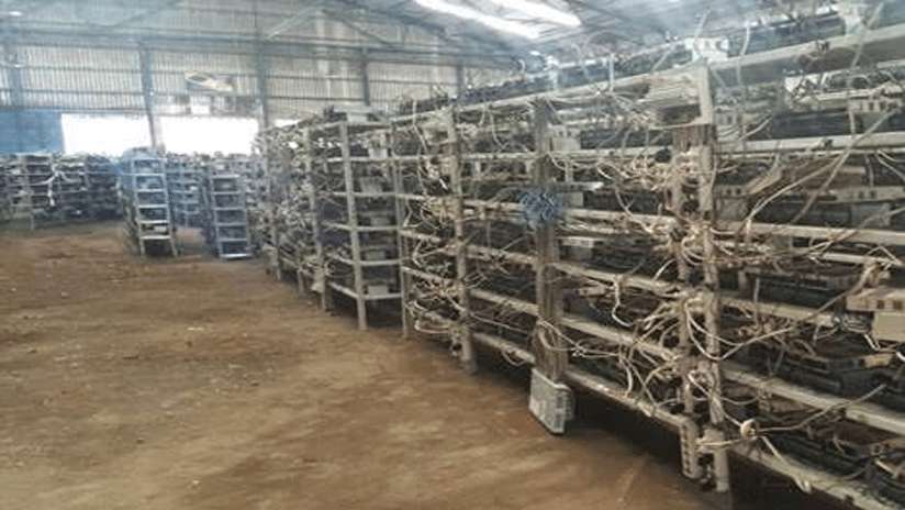 Seized warehouse with 11,000 bitcoin miners in Venezuela ||| Policía Nacional Bolivariana (PNB)