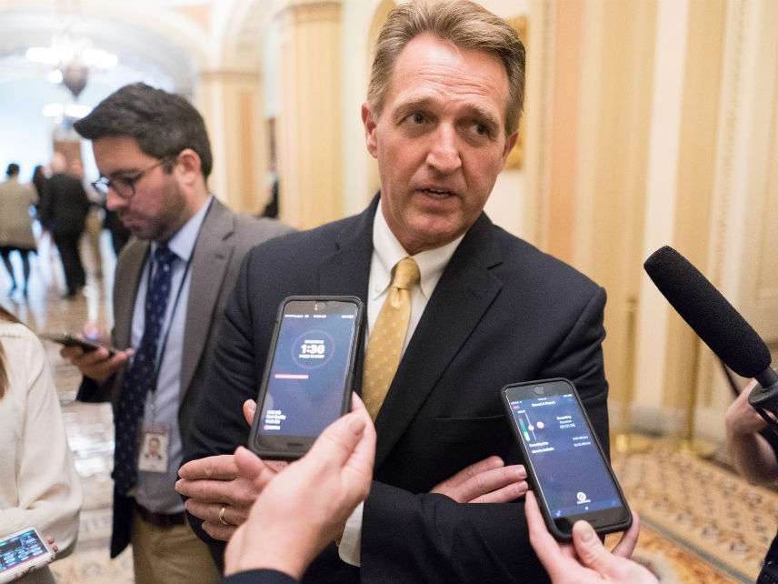 Jeff Flake talks to reporters. And talks to reporters…. ||| ERIN SCHAFF/UPI/Newscom