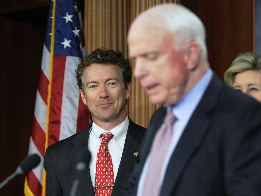 Rand Paul smiles as John McCain mistakenly refers to him as a congressman in October 2011. ||| JONATHAN ERNST/REUTERS/Newscom