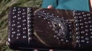 TSA: Keeping our nation safe from dangerous fashion choices. pistol purse