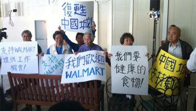 They're protesting in favor of Wal-Mart. 
