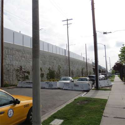 Exposition Boulevard at La Brea Boulevard is closed to through traffic, exacerbating L.A.'s traffic congestion. Exposition Boulevard at La Brea Boulevard is closed to through traffic, exacerbating L.A.'s traffic congestion.