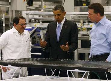 Solyndra's Ben Bierman and Chris Gronet welcome benefactor Barack Obama. 