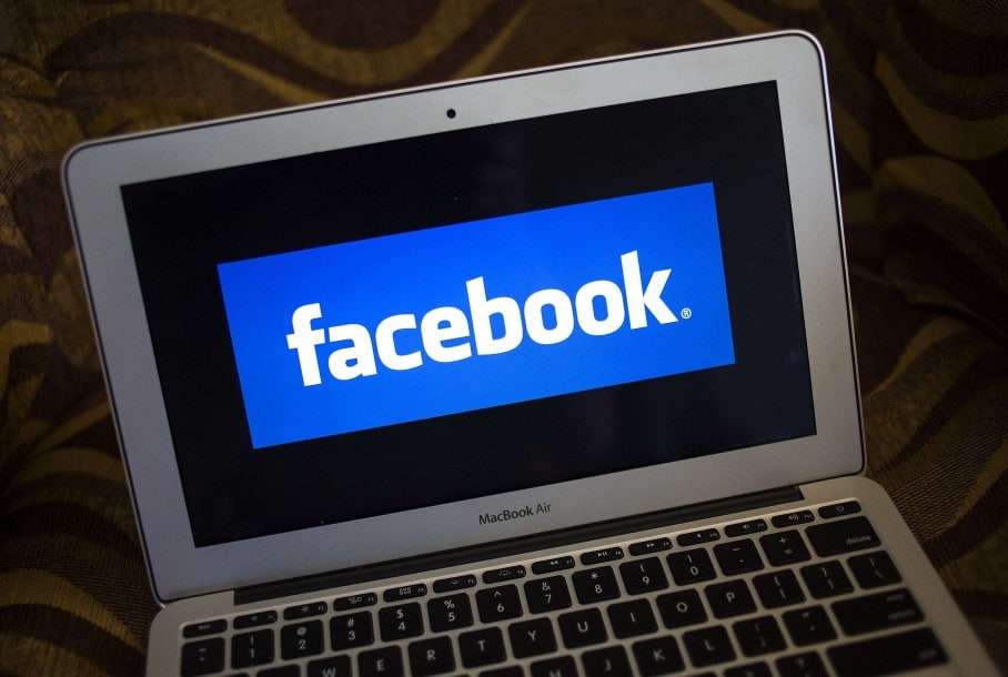 A Facebook logo is shown on a notebook in Ventura, California in this December 21, 2013 file photo. Facebook has more than 400 employees in Seattle, up from 125 only two years ago, vastly outstripping the social network's overall growth. It recently took over a second floor in its rented offices to handle the overflow, and is starting to fill a third. REUTERS/Eric Thayer/Files (UNITED STATES - Tags: BUSINESS LOGO)