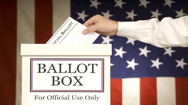 Ballot Box With Hand Voting