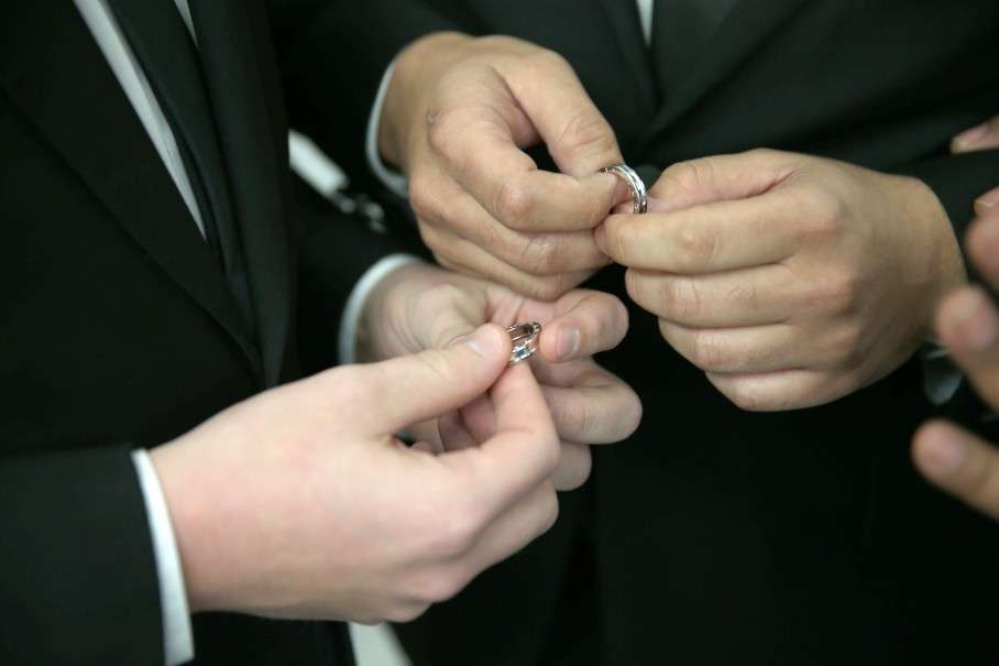 FORT LAUDERDALE, FL - JANUARY 06: A couple exchange rings as they are wed during a wedding ceremony at the Broward County Courthouse on January 6, 2015 in Fort Lauderdale, Florida. Gay marriage is now legal statewide after the courts ruled that the ban on gay marriage is unconstitutional and the Supreme Court declined to intervene. (Photo by Joe Raedle/Getty Images)