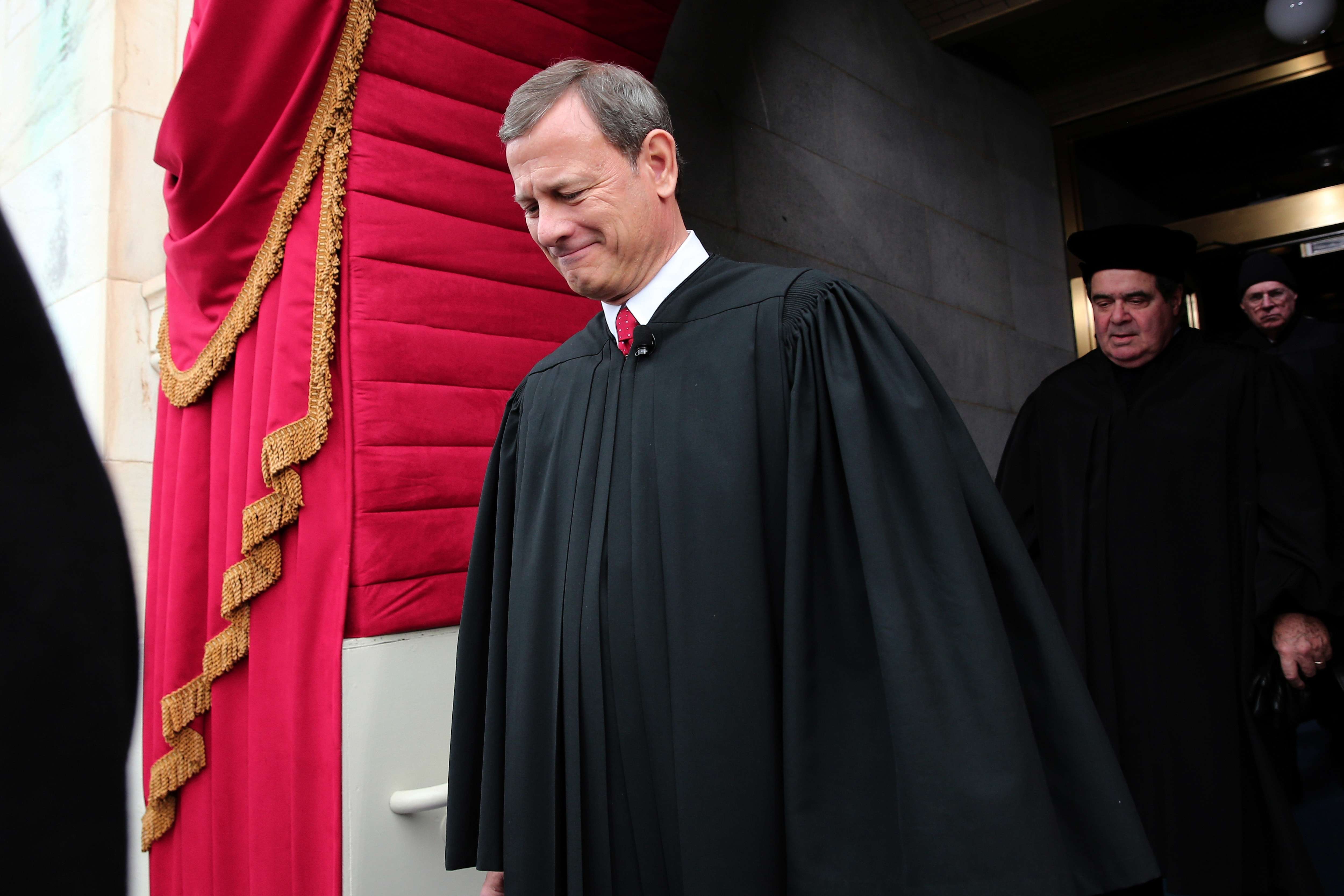 WASHINGTON, DC - JANUARY 21: Supreme Court Chief Justice John Roberts arrives during the presidential inauguration on the West Front of the U.S. Capitol January 21, 2013 in Washington, DC. Barack Obama was re-elected for a second term as President of the United States. (Photo by POOL Win McNamee/Getty Images)