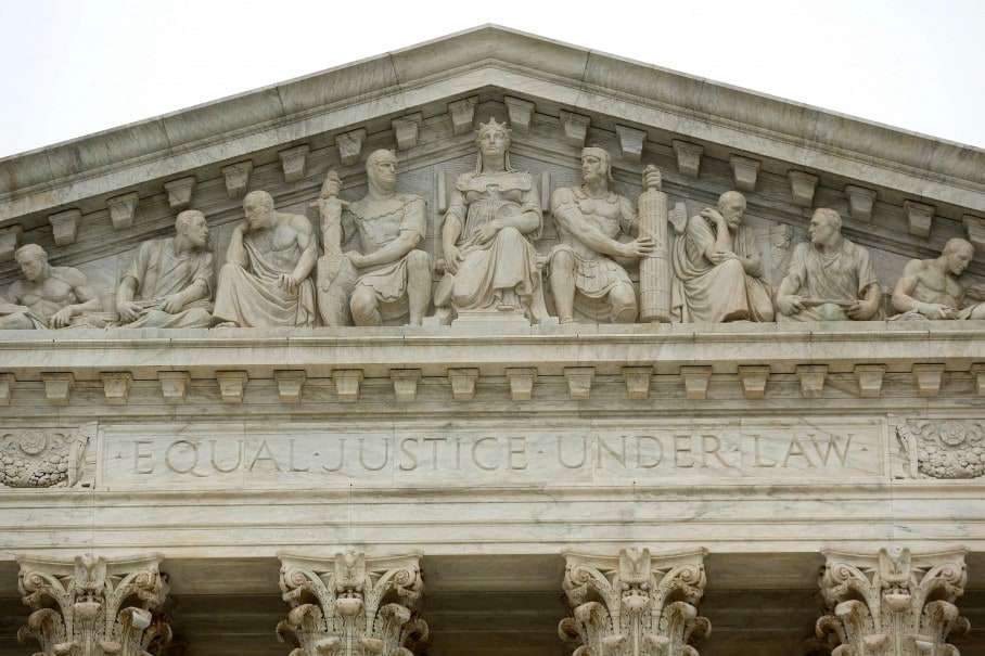 The west entrance to the U.S. Supreme Court building is seen in file photo taken in Washington December 3, 2014. Several demonstrators disrupted the start of business at the U.S. Supreme Court on Wednesday on the fifth anniversary of the court's contentious ruling that lifted limits on corporate spending in federal election campaigns. REUTERS/Jonathan Ernst/Files (UNITED STATES - Tags: POLITICS LAW BUSINESS)